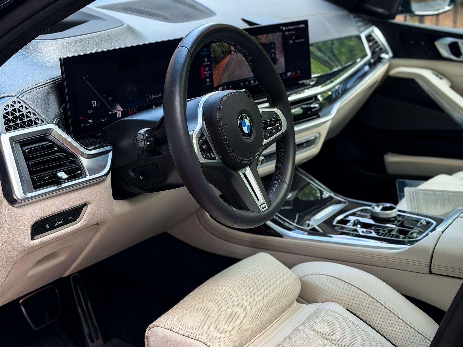 Detailed BMW interior with white leather seats and clean dash, Charlotte NC