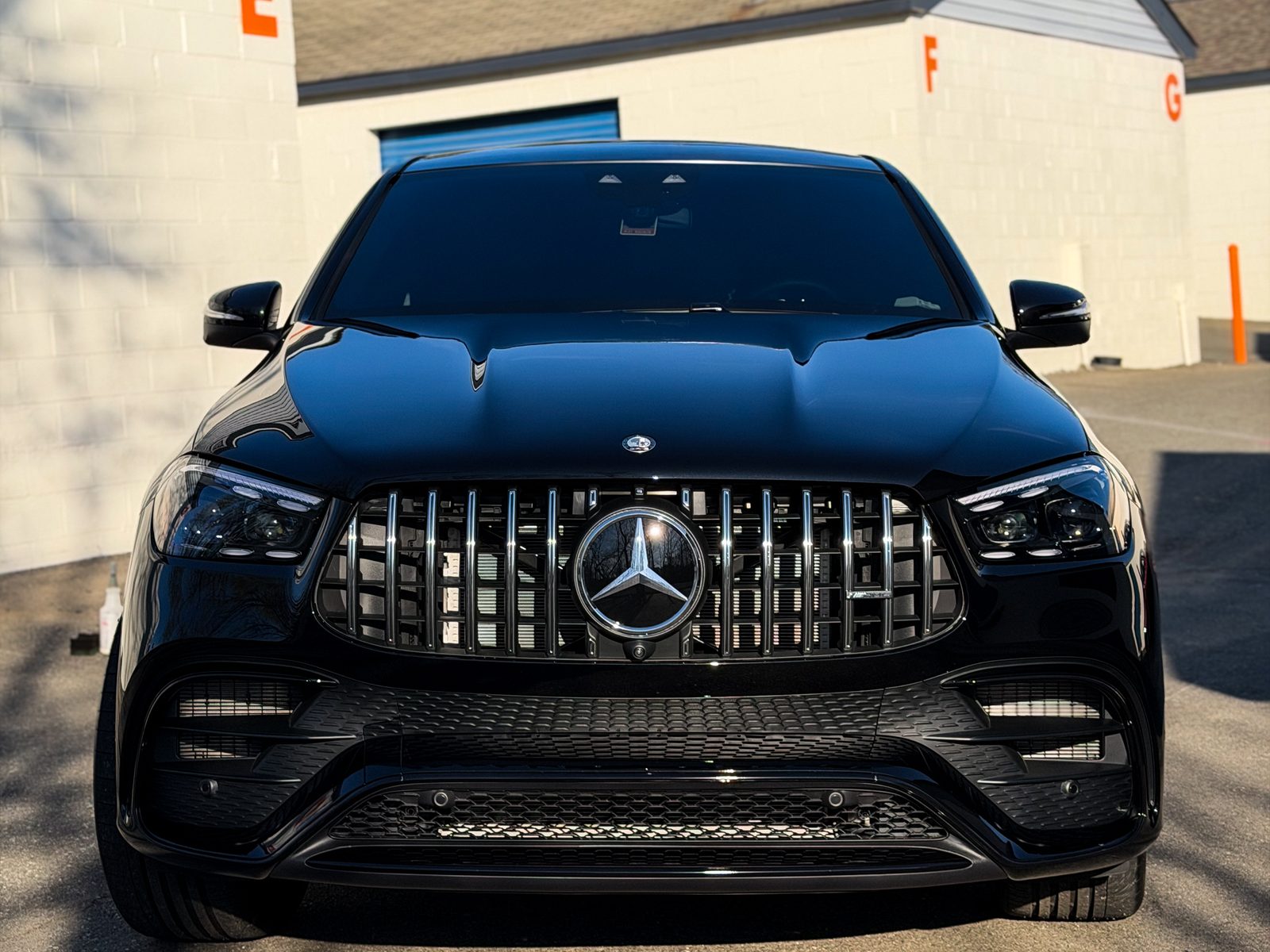 Black Mercedes-AMG SUV front grille, Red Wagon Detailing Charlotte NC