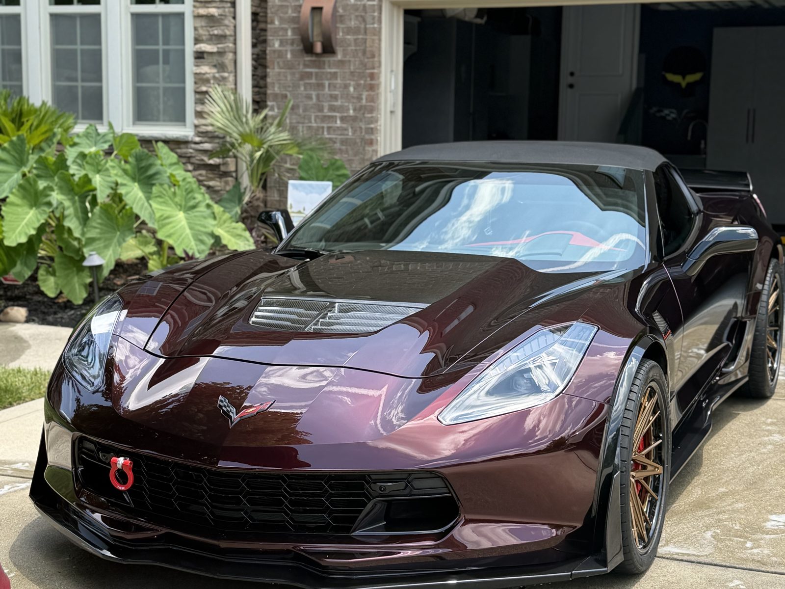 Maroon Chevrolet Corvette convertible with bronze wheels, Red Wagon Detailing Charlotte NC