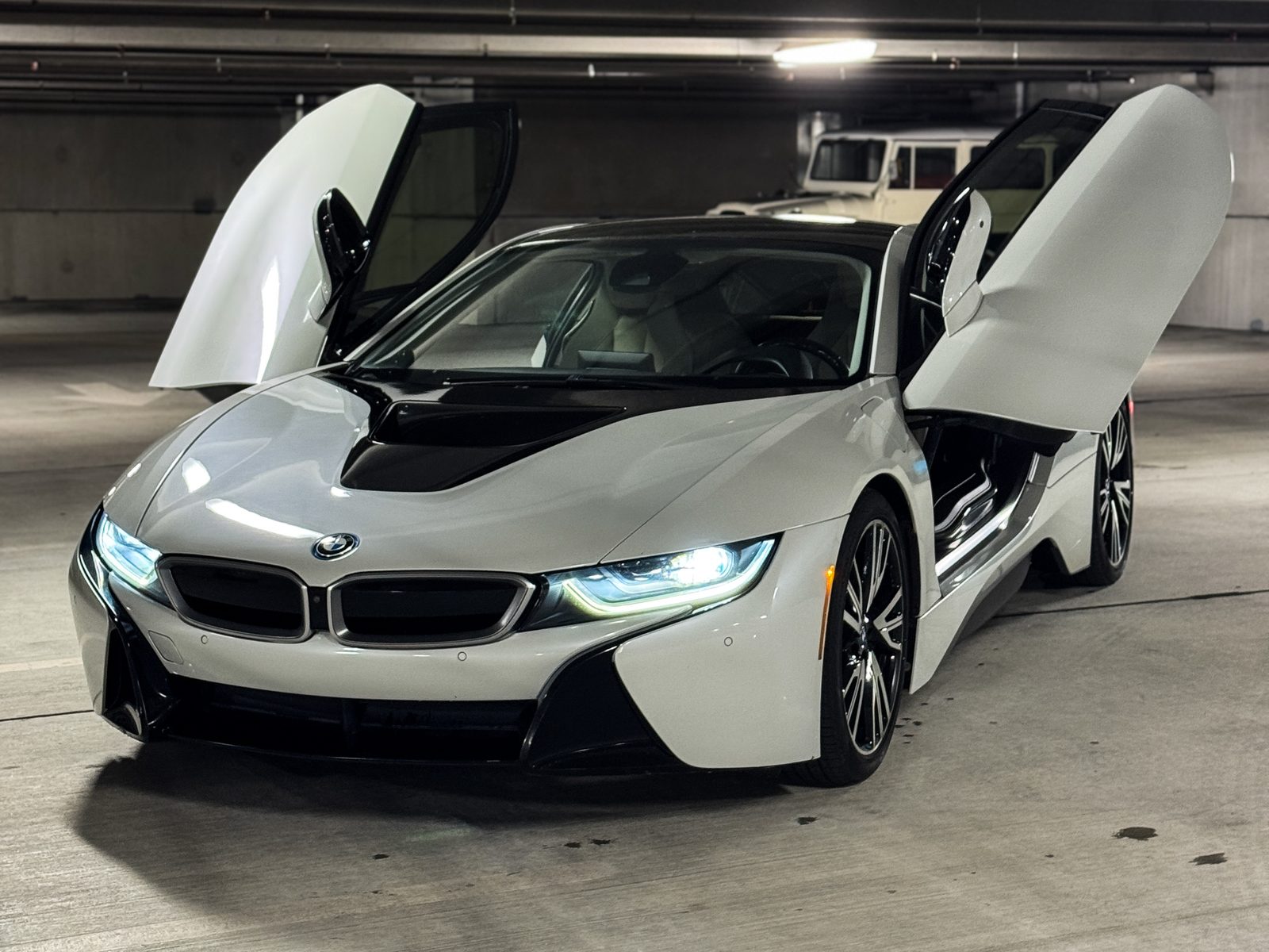 White BMW i8 with doors open, Red Wagon Detailing Charlotte NC