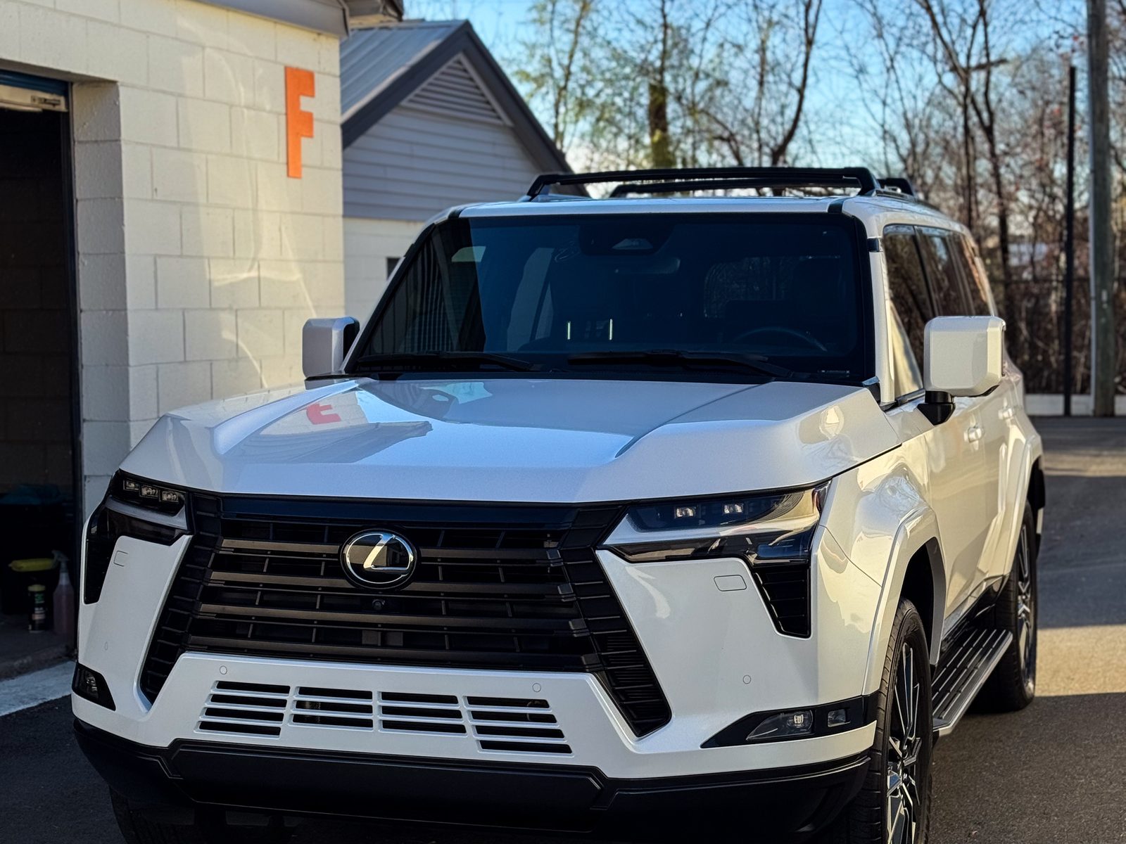 White Lexus SUV front view, Red Wagon Detailing Charlotte NC